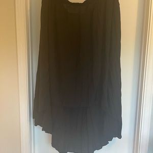 Asymmetrical, high-low skirt.